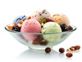 Dish with colored scoops of ice cream with nuts and chocolate chips Royalty Free Stock Photo