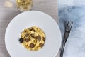 Dish of delicious italian pasta tagliatelle with truffle mushroom chips Royalty Free Stock Photo