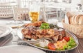 A dish of different meats - beef, pork, chicken, Turkey and grilled vegetables Royalty Free Stock Photo