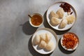 A dish of edible bird nest and jujube decorated with cordyceps and a ceramic bowl containing bird nest soup Royalty Free Stock Photo