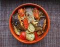 A dish of fish with vegetables. Royalty Free Stock Photo