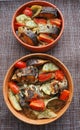A dish of fish with vegetables. Royalty Free Stock Photo