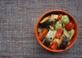 A dish of fish with vegetables. Royalty Free Stock Photo