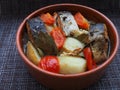 A dish of fish with vegetables. Royalty Free Stock Photo