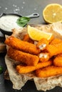 Dish of fishfingers with sauce. Food recipe background. Close up Royalty Free Stock Photo