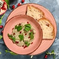 Dish with hummus and white bread