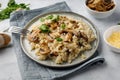 A dish of Italian cuisine - risotto from rice and mushrooms Royalty Free Stock Photo