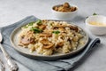 A dish of Italian cuisine - risotto from rice and mushrooms Royalty Free Stock Photo