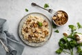 A dish of Italian cuisine - risotto from rice and mushrooms. Royalty Free Stock Photo