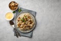 A dish of Italian cuisine - risotto from rice and mushrooms. Top view. Royalty Free Stock Photo