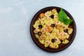 Dish of italian pasta bow with seafood