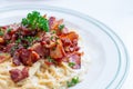 Dish of Italian spaghetti carbonara sauce with bacon. Royalty Free Stock Photo