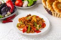 Dish with meat, noodles and vegetables. Traditional oriental dish. Royalty Free Stock Photo