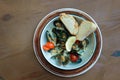 Top view of seafood dish with mussels in creamy sauce