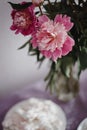 dish with pink marshmallow, floral table decoration