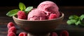 Sweet raspberry ice cream with fresh raspberries and mint leaves Royalty Free Stock Photo