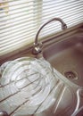 Dish sink in kitchen room Royalty Free Stock Photo