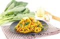 Dish of stir fried yellow noodles with meat and vegetable