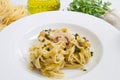 Dish with tagliatelle and mushrooms and fresh ingredients Royalty Free Stock Photo