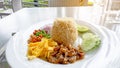 A dish of Thai food called Rice Mixed Shrimp Paste, the recipes are fired rice, sweet pork, yellow omelet, dried shrimp