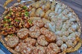 Dish with traditional fresh baked Moroccan cookies close up served with tea Royalty Free Stock Photo