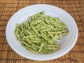 Dish of trofie al pesto: handmade pasta with basil sauce Royalty Free Stock Photo