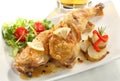 Dish of two roasted chicken legs Royalty Free Stock Photo