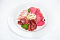 Dish of various types of meat-cutting on plate. Royalty Free Stock Photo