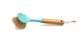 Dish washing brush isolated on white. Blue pastel dish brush with wooden handle. Kitchen equipment Royalty Free Stock Photo