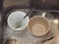 Dish washing cups Royalty Free Stock Photo