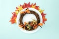 dish with wreaths and autumn leaves decorative Royalty Free Stock Photo