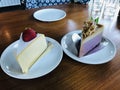 Dish of yummy Strawberry Cheesecake and Taro Custard Cake.