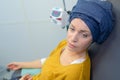 Disheartened woman during chemotherapy