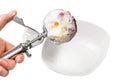 disher scoop with blueberry ice cream over bowl Royalty Free Stock Photo