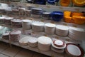Dishes And Bowls Stacked For Sell At A Shop . Different Selections Of Plates In Sale In Front Of The Shop. Selections Have