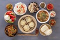 Dishes of Chinese cuisine in assortment. Steam dumplings, noodles, salads, vegetables, mushrooms, seafood. Royalty Free Stock Photo