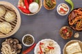 Dishes of Chinese cuisine in assortment. Steam dumplings, noodles, salads, vegetables, mushrooms, seafood. Royalty Free Stock Photo