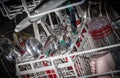 Dishes inside modern dishwasher Royalty Free Stock Photo