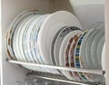 The dishes are stacked neatly on top of each other, with a variety of sizes and patterns Royalty Free Stock Photo
