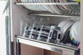 The dishes are stacked neatly on top of each other, with a variety of sizes and patterns Royalty Free Stock Photo