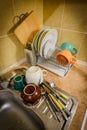 Dishes and Tableware Drying in Kitchen Royalty Free Stock Photo