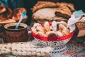 Dishes of the traditional Belarusian cuisine - fresh pastries and honey.