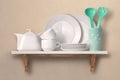 Dishes on a wooden shelf