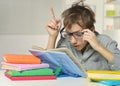 Disheveled boy wearing glasses Royalty Free Stock Photo