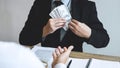 Dishonest cheating in business illegal money, Businessman receive bribe money in business people to give success the deal contract Royalty Free Stock Photo