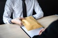 Dishonest cheating in business illegal money, Businessman receive bribe money in envelope to business people to give success the Royalty Free Stock Photo