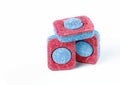 Dishwasher tablets for cleaning dishes isolated on white. Selective focus. Detergent or cleaning agent. Royalty Free Stock Photo