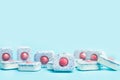 Dishwasher tablets on a light blue background Royalty Free Stock Photo