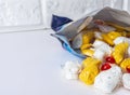 dishwashing capsules in front of an open package on a white background Royalty Free Stock Photo