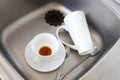 Dishwashing. White dishes in the kitchen sink. Royalty Free Stock Photo